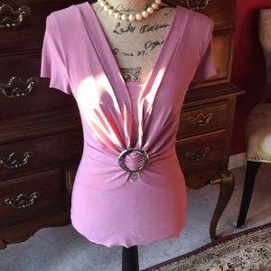 Very stylish and a little sexy v neck jersey top.